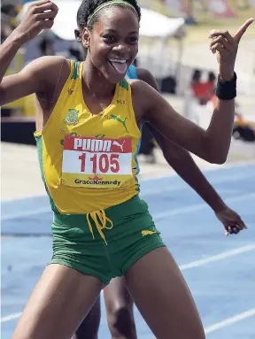  ?? FILE ?? Kimara Francis of St Jago High celebrates after winning the Class Two Girls 400m at last year’s Boys and Girls’ Championsh­ips. Francis is a former Seaforth High athlete.