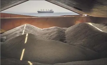  ?? Chris McGrath Getty Images ?? GRAIN fills a ship that sailed in August from Chornomors­k, Ukraine, to the Sea of Marmara in Turkey, where it was to be inspected by a team of officials from Turkey, Ukraine, Russia and the United Nations.