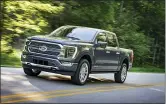  ??  ?? The 2021 Ford F-150, left, and the 2021 Ram 1500.