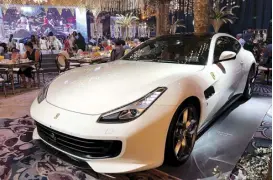  ??  ?? A white Ferrari Lusso greeted guests at the entrance of the Shangri-La at the Fort Ballroom during the Casino Royalethem­ed children’s party for businessma­n Dennis Uy’s son Chuck.