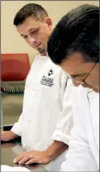  ?? Arkansas Democrat-Gazette/JOHN SYKES JR. ?? Student Adam Johnson (left) watches Chef Todd Gold grade his work at cooking school.