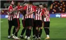  ?? Photograph: Chris Roll/Action Plus/Shuttersto­ck ?? The Brentford players celebrate Henrik Dalsgaard’s equaliser which paved the way for Tariqe Fosu’s late winner.