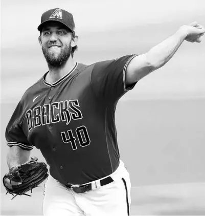  ?? ASHLEY LANDIS/AP ?? Diamondbac­ks left-hander Madison Bumgarner will start against the powerful Padres in Thursday’s opener.