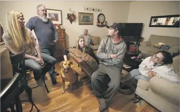  ?? Photograph­s by Genaro Molina Los Angeles Times ?? SHELLY LANNING, husband Tom, daughter Emily, son Cash and his wife, Michele Yepez, moved in with Lanning’s mother, Jeannie Anderson, in rear, in Ukiah after their homes in Santa Rosa were destroyed.