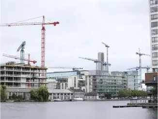  ??  ?? City life: Apartment blocks being built near the centre of Dublin