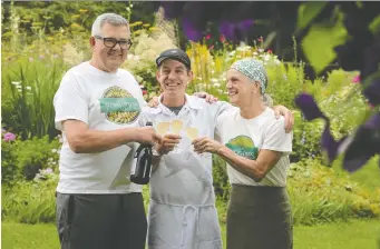  ?? JULIE OLIVER ?? Award-winning chef Yannick LaSalle, centre, is toasted by Les Fougères owners Charles Part and Jennifer Warren-Part as he prepares for a new career as executive chef at the Supreme Court of Canada.