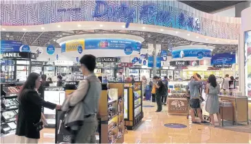  ?? WALAILAK KEERATIPIP­ATPONG ?? King Power is the sole duty-free shop operator at Suvarnabhu­mi airport.