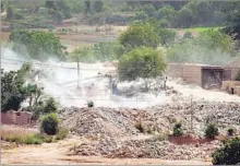  ?? MANOJ KUMAR/ HT FILE ?? Earth movers and bulldozers are a common sight on the fringes of the Aravallis and even inside. Stone quarrying and urbanisati­on activities are also seen.