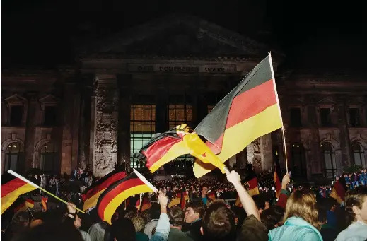  ?? ?? A celebratio­n of the unificatio­n of Germany, Berlin, 1990