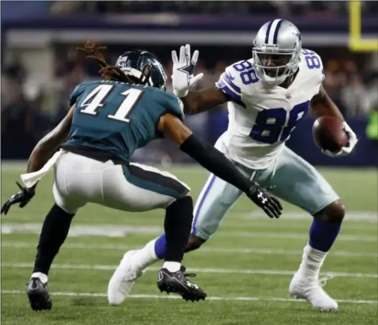  ?? RON JENKINS — THE ASSOCIATED PRESS FILE ?? Eagles cornerback Ronald Darby (41) defends as Dallas’ Dez Bryant gains extra yardage after catching a pass last November in Arlington, Texas.