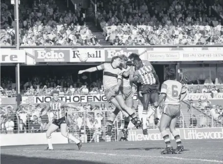  ??  ?? Gary Bennett during Sunderland’s win over Hull City at Roker Park in September 1986, one of thousands of times he headed the ball.