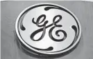  ??  ?? GE reported a $9.83B loss in Q4. AP