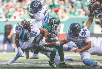  ?? KAYLE NEIS/THE CANADIAN PRESS ?? The Argos and Roughrider­s will be the combatants in a July 25 contest at Saint Mary’s University in Halifax. A 2005 exhibition game there between the Argos and Ticats drew 11,148 fans.