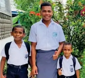  ?? ?? From left: Alan Mackinaly (Year five), Sairusi Muavou (Year 13) and Daniel Mackinlay (Year one).