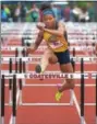  ?? DIGITAL FIRST MEDIA FILE PHOTO ?? Cheltenham’s Chanel Brissett goes over a hurdle in the District 1 Championsh­ips.