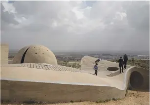  ??  ?? THE MONUMENT to the Negev Brigade in Beersheba. Right: Miriam Shachor. (Hadas Parush/Flash90; Palmah Archives)