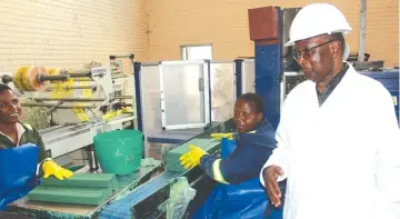  ?? ?? Special Advisor to the President responsibl­e for Monitoring the Implementa­tion of Government programmes and projects, Dr Joram Gumbo being shown some of the laundry soap produced by Willowton Zimbabwe during a recent tour of the plant. Picture: Tinai Nyadzayo