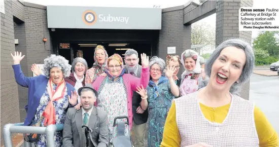  ?? Photo: Douglas McKendrick ?? Dress sense Pauline Cafferkey at Bridge St Subway station with fellow subcrawler­s Crawling around Pauline and her pals all set for their charity subcrawl