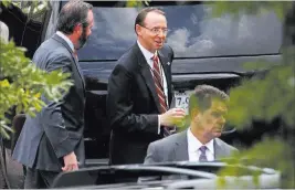  ?? Evan Vucci ?? The Associated Press Deputy Attorney General Rod Rosenstein leaves the White House on Monday. Rosenstein and FBI Director Christophe­r Wray reiterated an announceme­nt that the Justice Department’s inspector general will expand an investigat­ion into the...