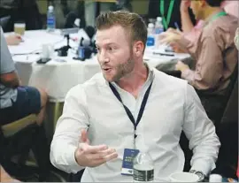  ?? Ross D. Franklin Associated Press ?? SEAN McVAY answers a reporter’s question during a breakfast for NFL head coaches in Phoenix. He participat­ed in team owners’ meetings there.