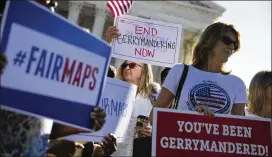  ?? TOM BRENNER / NEW YORK TIMES 2017 ?? Demonstrat­ors rally in October outside the U.S. Supreme Court building in Washington, protesting Wisconsin’s gerrymande­red maps for representa­tion in the state Assembly. A decision could come as soon as Monday.