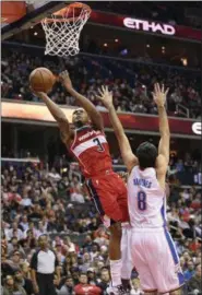  ?? NICK WASS - THE ASSOCIATED PRESS ?? Washington Wizards guard Bradley Beal (3) goes to the basket against Oklahoma City Thunder guard Alex Abrines (8) during the second half of an NBA basketball game Friday, Nov. 2, 2018, in Washington. The Thunder won 134-111.