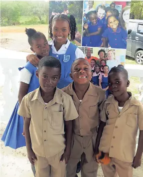  ?? CONTRIBUTE­D PHOTOS ?? These students of the Church Hill Primary School in Santoy are among the beneficiar­ies of the new computer laboratory which was built and outfitted by Hanover Charities, the charitable arm of Round Hill Hotel.