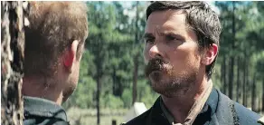  ??  ?? Christian Bale delivers a compelling performanc­e as a conflicted army captain charged to fulfil an order he doesn’t like.