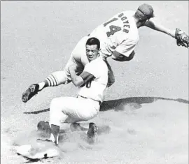  ?? Associated Press ?? THE DODGERS’ Maury Wills brought a new dimension to the game with his speed on the basepaths, leaving some to wonder why he isn’t in the Hall of Fame.