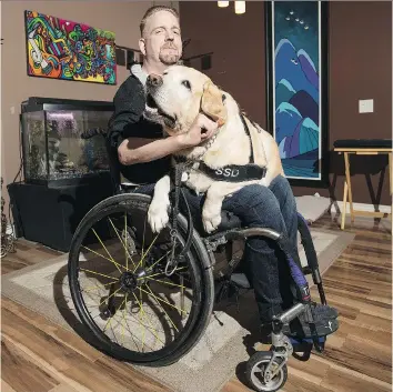  ??  ?? Jay Stanoffsky and his service dog Harlem at home in Saskatoon on Friday. Stanoffsky launched a GoFundMe campaign to retrofit the Jewel of the North resort to be fully accessible to wheelchair users. LIAM RICHARDS