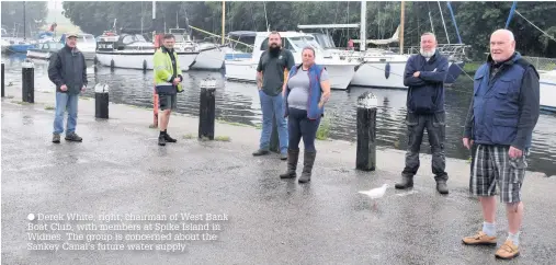  ??  ?? Derek White, right, chairman of West Bank Boat Club, with members at Spike Island in Widnes. The group is concerned about the Sankey Canal’s future water supply