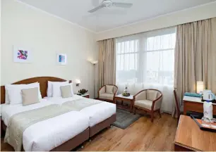 ??  ?? From top: The suites of the hotel offer panoramic views; the rooms at Clarks Avadh ensure comfort and luxury.