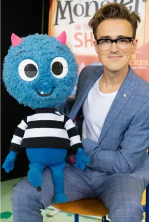 ?? ?? Tom Fletcher and his pal Little Monster