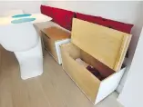  ?? JOHN MAHONEY, GAZETTE FILES ?? Storage boxes double as seats in a 268-square-foot micro condo in the Lowney sur Ville project in Griffintow­n. The unit, which was crowned smallest new condo in Canada in 2014, requires a pull-out couch for a bed.