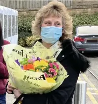  ??  ?? ● Jean Southworth leaves after her last day working at Marks and Spencer