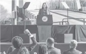  ?? AGENCE FRANCE PRESSE ?? U.S. Vice President Kamala Harris speaks as Tennessee state Rep. Justin Pearson pumps his fist on the 59th commemorat­ion of the Bloody Sunday Selma bridge crossing in Selma, Alabama.