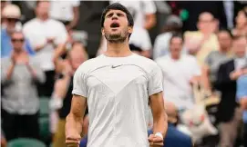  ?? Alastair Grant/Associated Press ?? Carlos Alcaraz celebrates beating Nicolas Jarry at Wimbledon on Saturday in London.