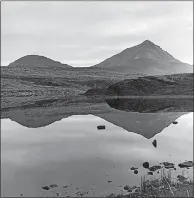  ?? COURTESY OF RACHEL BROWN ?? Errigal and Little Errigal reflected in Lough Gaineamh, 1992