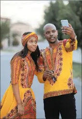  ??  ?? Modern Xhosa couple, Aqhama and her husband Chumani Waxa.