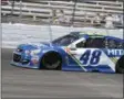  ?? LARRY PAPKE — THE ASSOCIATED PRESS ?? Jimmie Johnson comes out of Turn 4during the NASCAR Cup Series auto race at Texas Motor Speedway in Fort Worth, Texas, Sunday. Johnson won the race.