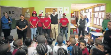  ??  ?? HEARTFELT TREAT: KFC team members from the local Port Elizabeth stores were treated to singing by the children at Uviwe’s Schaudervi­lle Early Childhood Developmen­t Centre