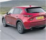  ??  ?? Open road The Mazda CX-5 SUV eats up the miles
