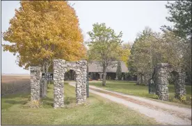  ??  ?? It took Stenzel 10 years to build this house near Wells, Minn. Stenzel has been crafting buildings, sculptures and other works out of stone for 70 years. The former pastor recently completed his last large-scale project.
(The Albert Lea Tribune /Colleen Harrison)