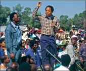  ??  ?? Charismati­c ANC military leader, Chris Hani, appeals to township supporters for an end to violence and to the factional killing, in the run up to first all-race elections.