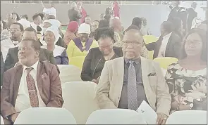  ?? (Pics: Mfanukhona Nkambule) ?? Prominent pastors in Bishop Nash Shongwe (L) next to Reverend J.V. Mazibuko and his wife Thulile, attended the consecrati­on of the 6th Bishop of the Evangelica­l Lutheran Church in Southern Africa, Zwanini Shabalala yesterday at UNESWA’s Sports Emporium.