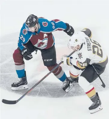  ?? JASON FRANSON/THE CANADIAN PRESS VIA AP ?? Nathan MacKinnon, left, and the Avalanche look poised for big things this season.