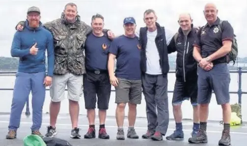  ??  ?? The ‘magnificen­t seven’ – Captain Tom Roach, Billy Isherwood, Ste ‘Stocky’ Stockford, Graham ‘Pono’ Ponton, Ste Doyle, Carl Roach and Jonathan Mahoney plus Lisa Mahoney, completed a 22-mile walk in aid of Mind, in recognitio­n of its work helping people...