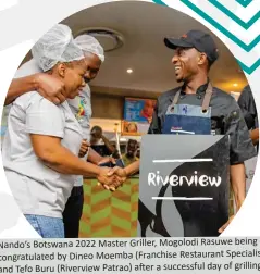  ?? ?? Nando’s Botswana 2022 Master Griller, Mogolodi Rasuwe being congratula­ted by Dineo Moemba (Franchise Restaurant Specialist) and Tefo Buru (Riverview Patrao) a  er a successful day of grilling.