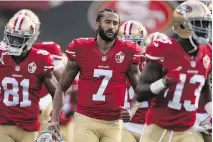  ?? EZRA SHAW/GETTY IMAGES/FILES ?? Quarterbac­k Colin Kaepernick, who courted controvers­y last season, remains a free agent.