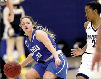  ?? Photo courtesy of Texas Wesleyan ?? John Brown University senior Kodee Powell dribbles the ball up the court against Texas Wesleyan on Saturday in Fort Worth, Texas. The Golden Eagles play at Science and Arts (Okla.) on Thursday before returning home to play St. Gregory’s (Okla.) at 3...